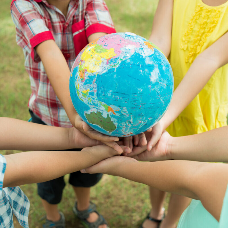 Kids holding the whole world of opportunities in their hands